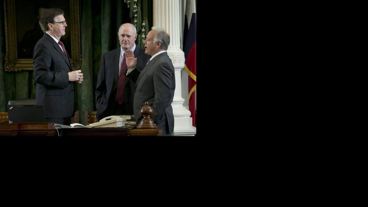 
From left, Lt. Gov. Dan Patrick, Sen. Kel Seliger and Sen. Kirk Watson talk in the Senate Chamber at the Capitol in Austin, Texas. 

