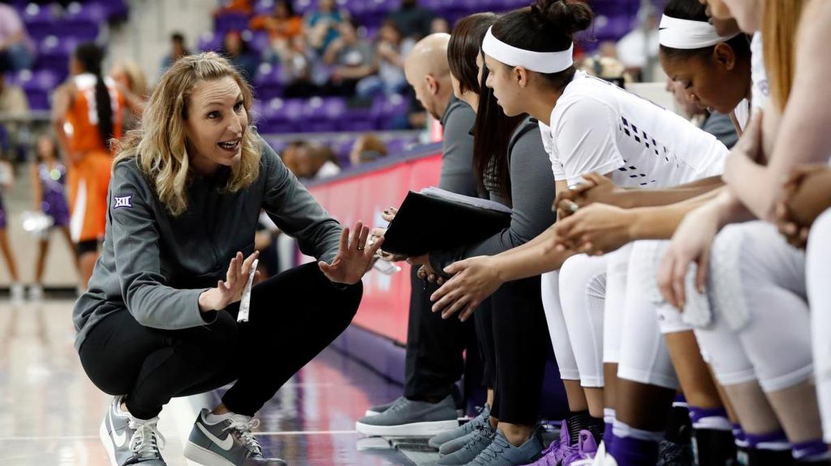In this Jan. 10, 2018 photo, TCU head coach Raegan Pebbley instructs her team during an NCAA college basketball game against Texas in Fort Worth, Texas. After the TCU women had pulled off what many considered a huge upset over Top 10 team Texas, top scorer Amy Okonkwo and the Horned Frogs went back to work _ and did it again.