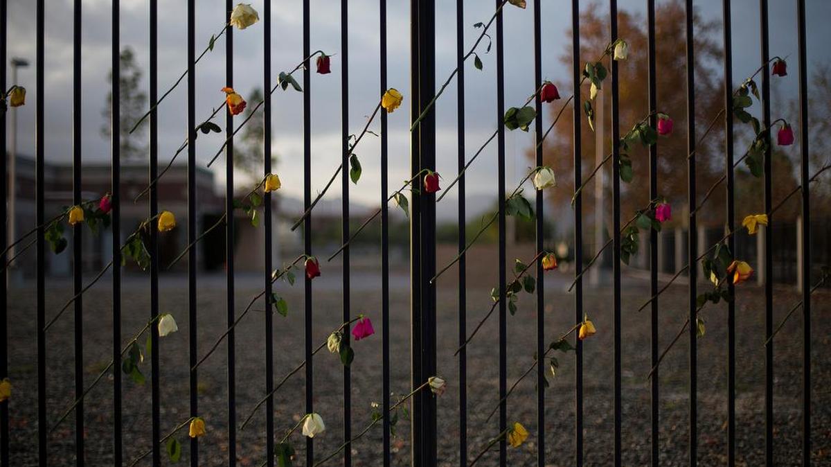 Roses adorn a makeshift memorial in San Bernardino, Calif.