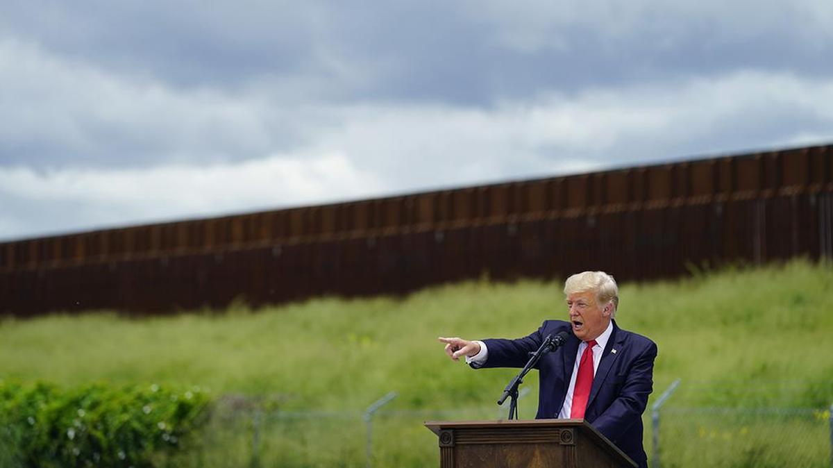 Donald Trump speaks during a visit to an unfinished section of border wall with Texas Gov. Greg Abbott, in Pharr, Texas, Wednesday, June 30, 2021.
