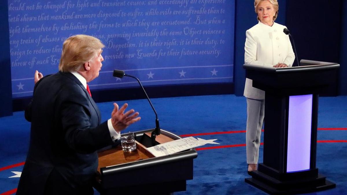 Democratic presidential nominee Hillary Clinton and Republican presidential nominee Donald Trump debate during the third presidential debate at UNLV in Las Vegas, Wednesday, Oct. 19, 2016.
