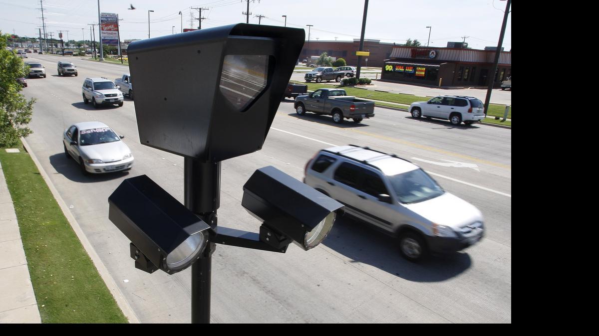 
Traffic moves past red light cameras in North Richland Hills.

