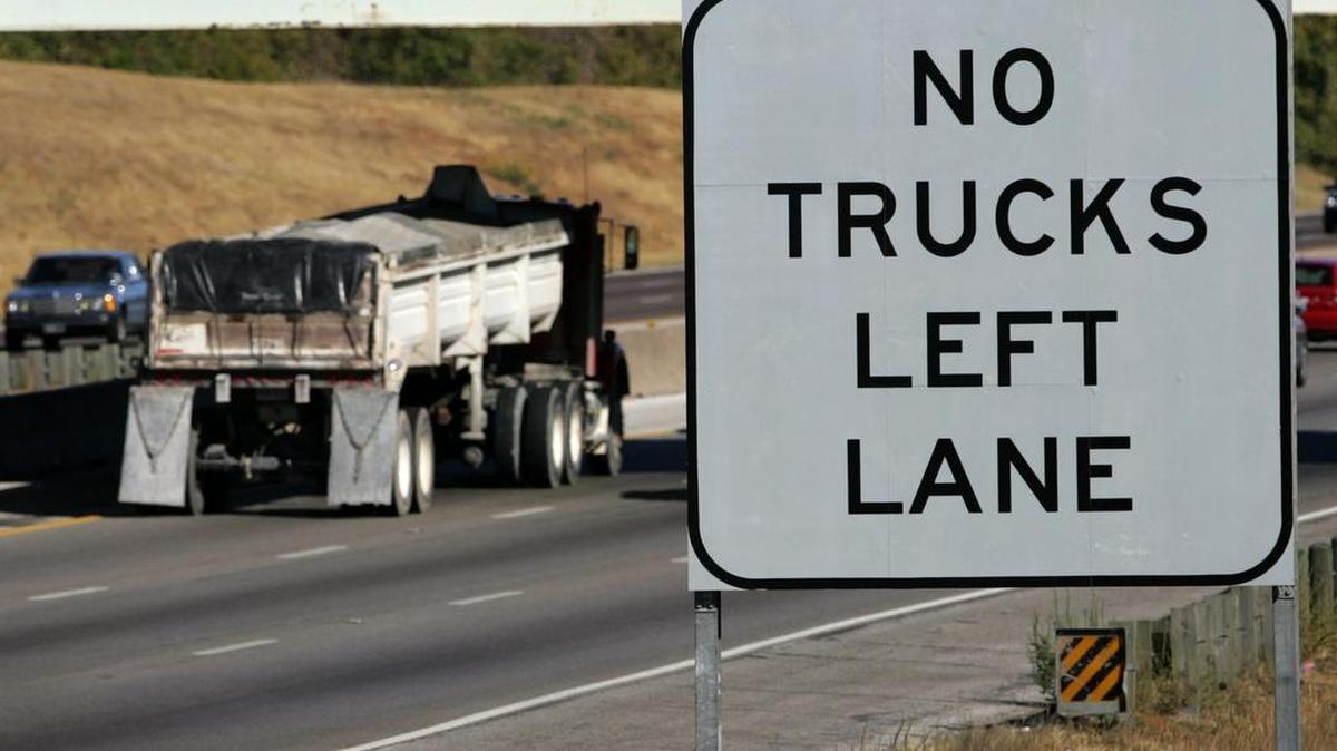 Trucks are banned from the left lane on some local freeways.