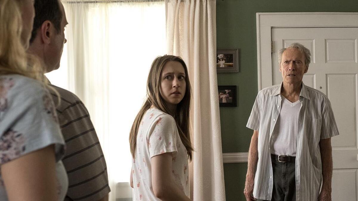 Taissa Farmiga, center, and Clint Eastwood in a scene from “The Mule.”