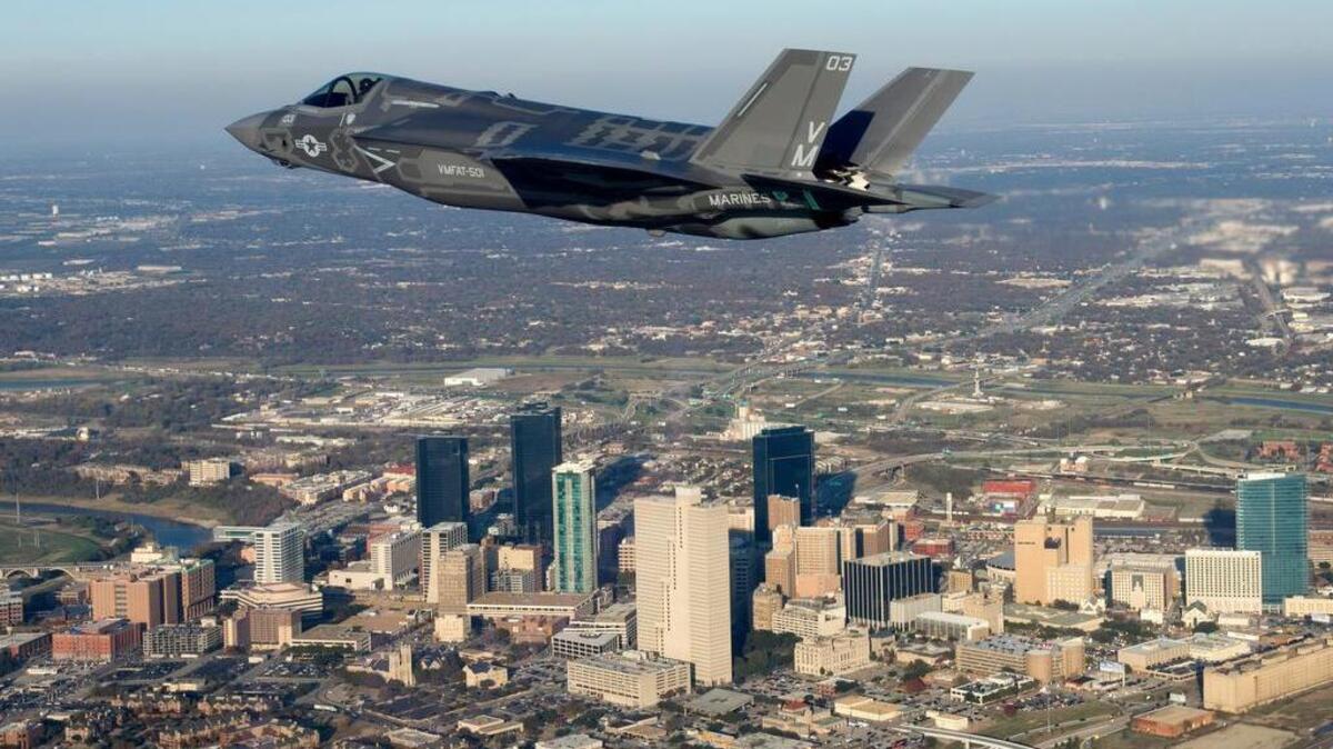 BF-8, Pilot Bill 'Gigs' Gigliotti. Photo op over downtown Fort Worth, Texas. Approved
