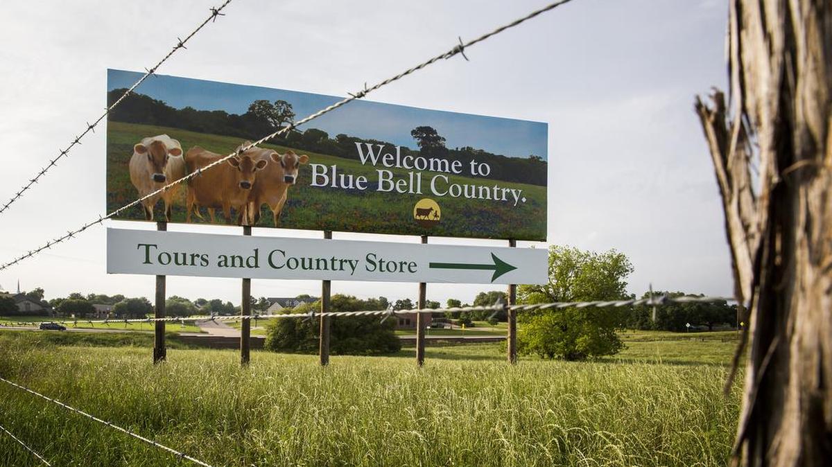 A billboard on U.S. Highway 290 points the way to the Blue Bell Creameries in Brenham.