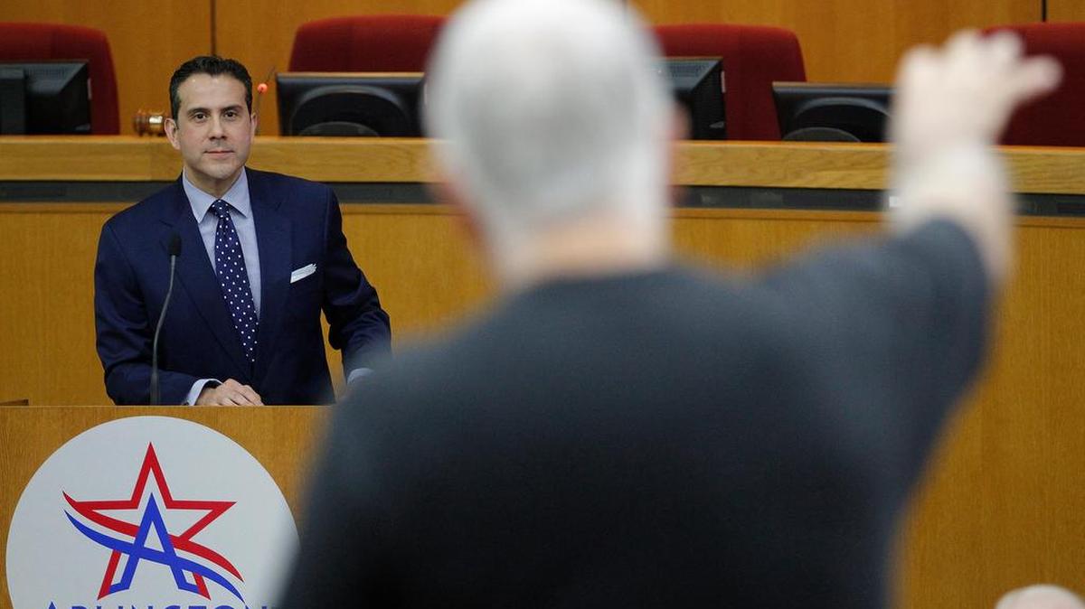 Arlington District 3 City Councilman Rivera listens to an opinion from a speaker at a town hall meeting. Rivera is not running for re-election.