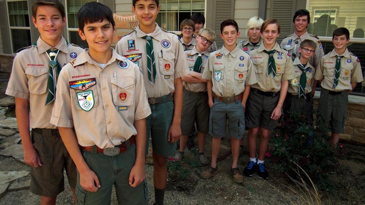 “Troll Patrol” and Troop 32 Eagle Scouts (from left) Joe Trenton, 14; Nicholas Bellinger, 15; and Brad Greer, 14, pose with other members of their patrol in Keller.