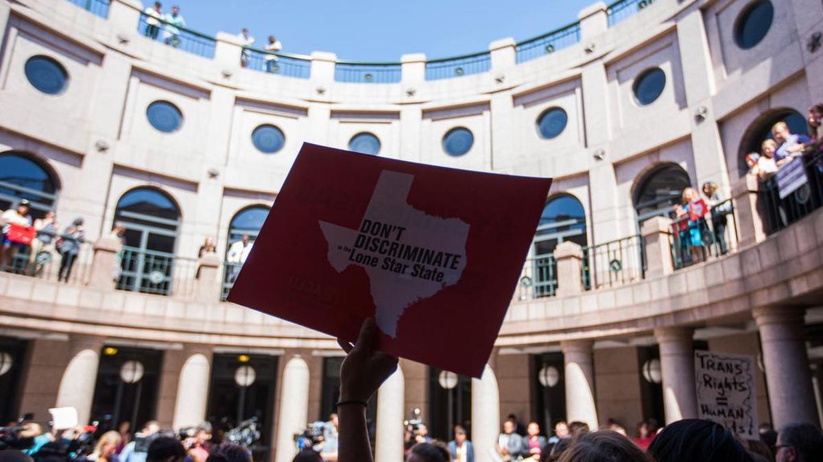 Protestors against the so-called bathroom bill rally in the capitol extension on the fourth day of a special legislative session on Friday, July 21, 2017, at the Texas state capitol in Austin, Texas. Legislation being debated would restrict the bathrooms available for use to transgender people. The country's largest oil, gas and chemical companies are the latest big businesses to come out against the bill.