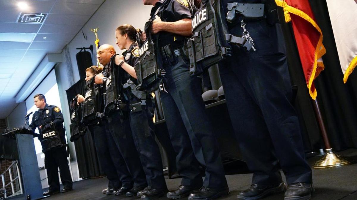 Six officers were given new vests during a Nov. 17 event celebrating a $355,000 donation for enhanced body armor.