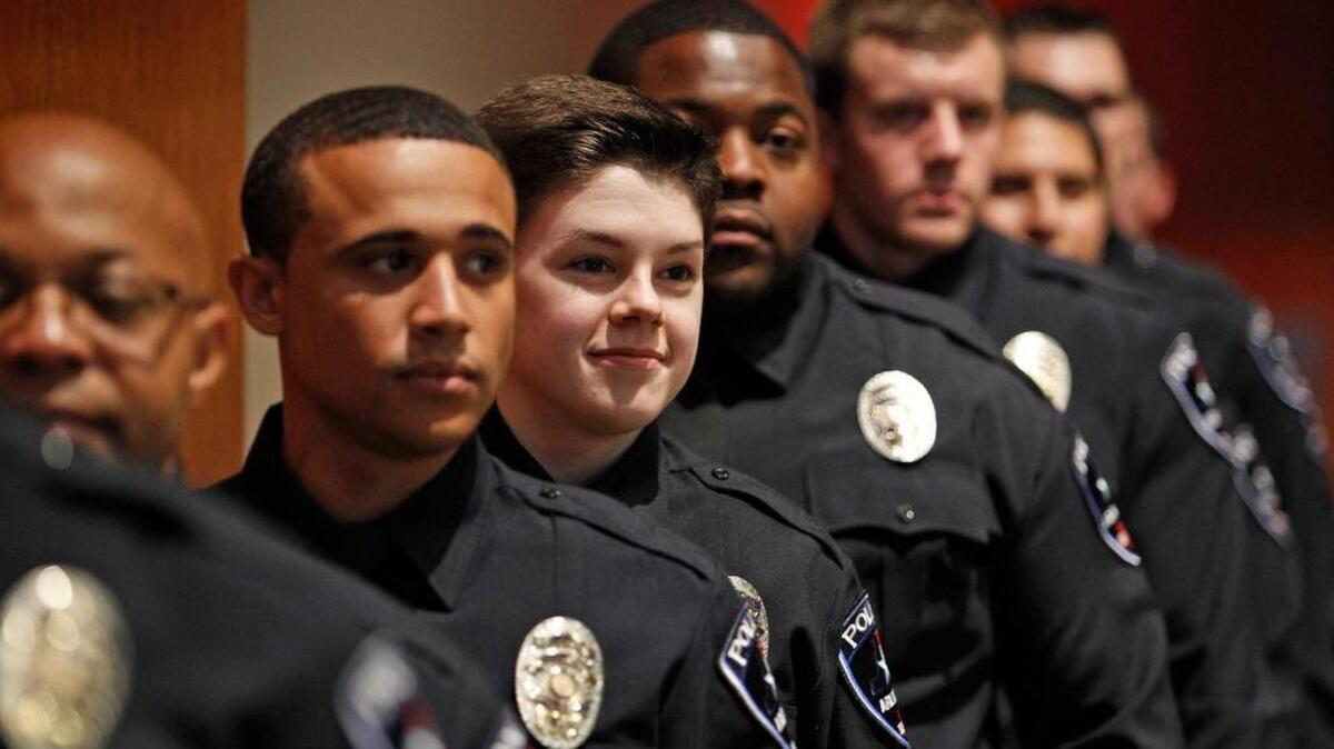 Arlington police academy graduates are welcomed to the force, a priority for the City Council.