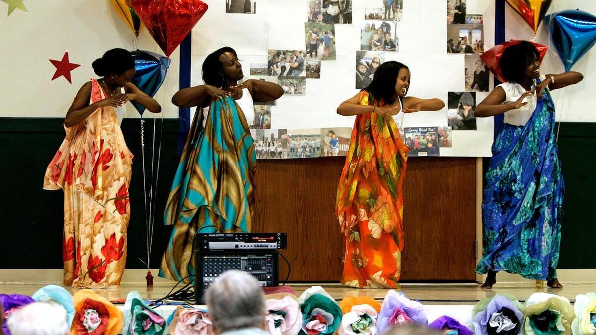 The Burundian dance group Akaranga performs at a World Refugee Day celebration in 2016 at Refugee Services of Texas.