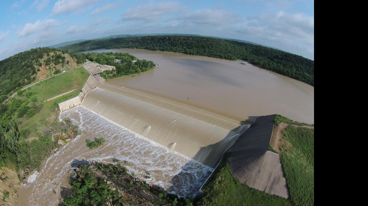 
Water pours over the spillway at Lake Palo Pinto on Thursday.
