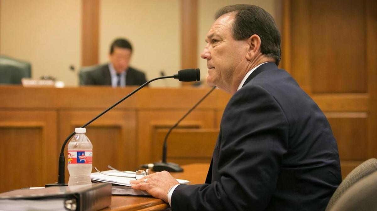 Texas Department of Family and Protective Services Commissioner Hank Whitman, seen testifying to a House committee in July, has proposed $12,000 raises for caseworkers.