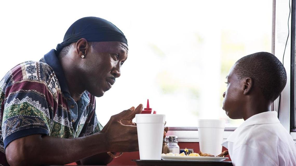 Mahershala Ali and Alex Hibbert in a scene from the best-picture Oscar-nominated movie, “Moonlight”