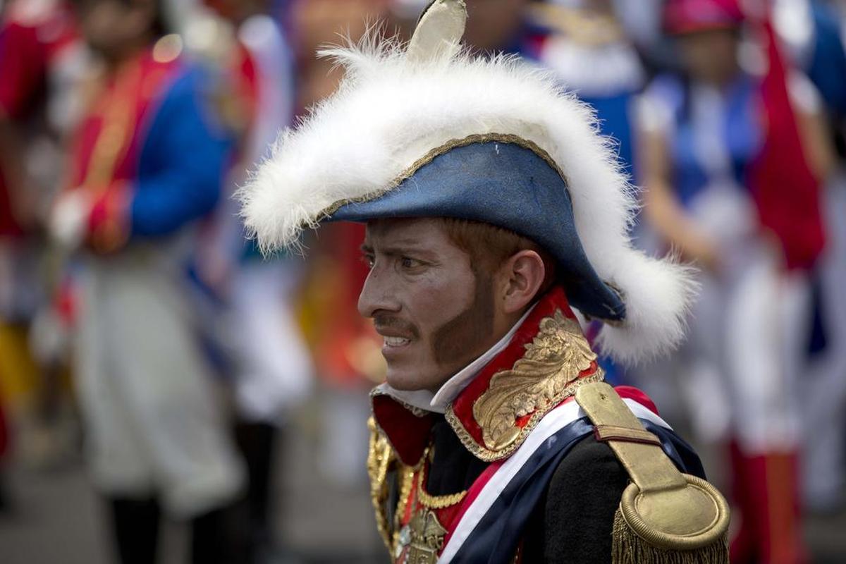 A man plays a French army officer during a re-enactment of the Battle of Puebla at a Cinco de Mayo celebration in Mexico City.