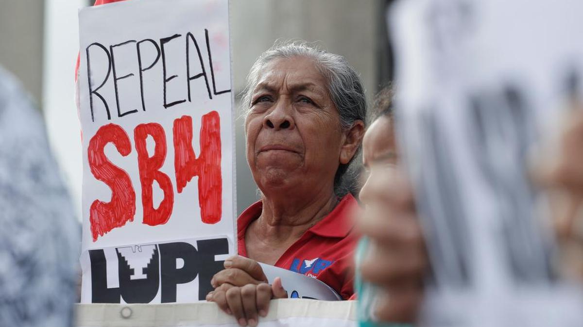Protesters gather outside the Federal Courthouse to oppose a new Texas "sanctuary cities" bill Monday in San Antonio.