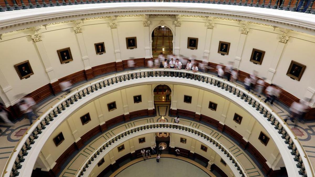 Visitors move though the rotunda at the Texas Capitol, Thursday, June 15, 2017, in Austin, Texas.