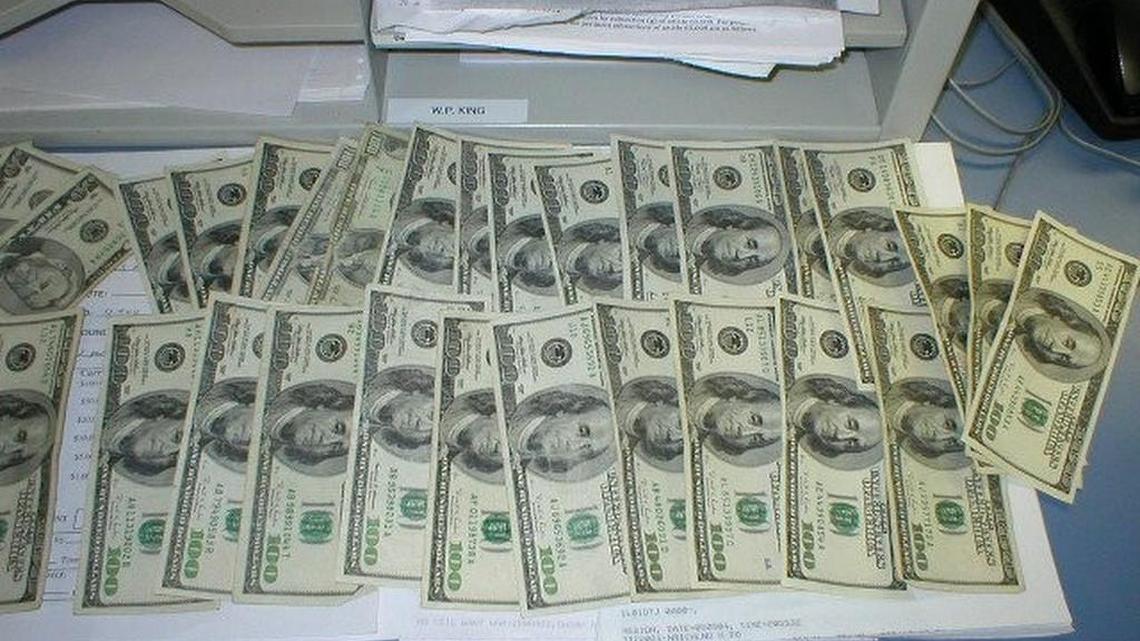 Cash seized by a law enforcement task force in Parker County in 2014.