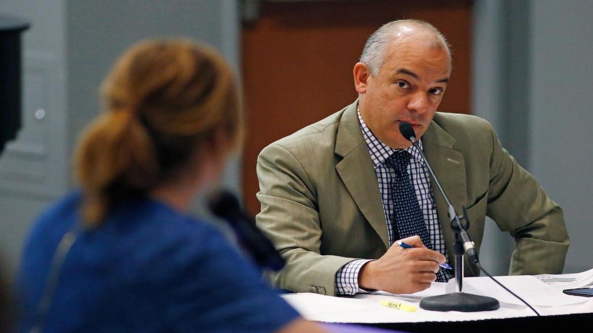State Rep. Chris Turner, D-Grand Prairie, listens to Kristene Blackstone, assistant commissioner of Child Protective Services in the Department of Family and Protective Services, testify at a committee hearing in August.