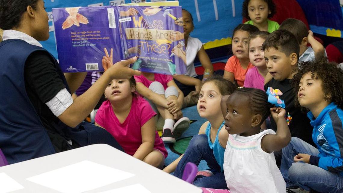 Teacher Alicia Love engages students during a lesson March 30 at the Gwendolyn C Gragg Child Development Center in Fort Worth.