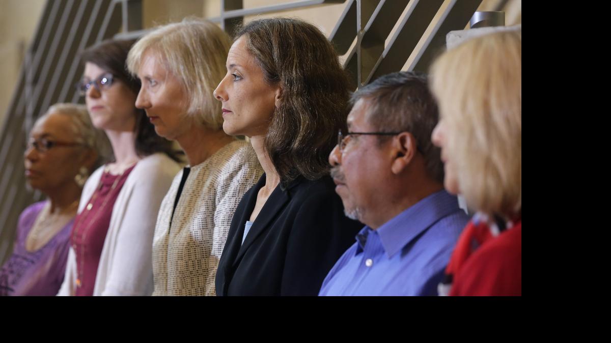 
Members of the Austin City Council listen to City Manager Marc Ott during a news conference at City Hall on May 13.
