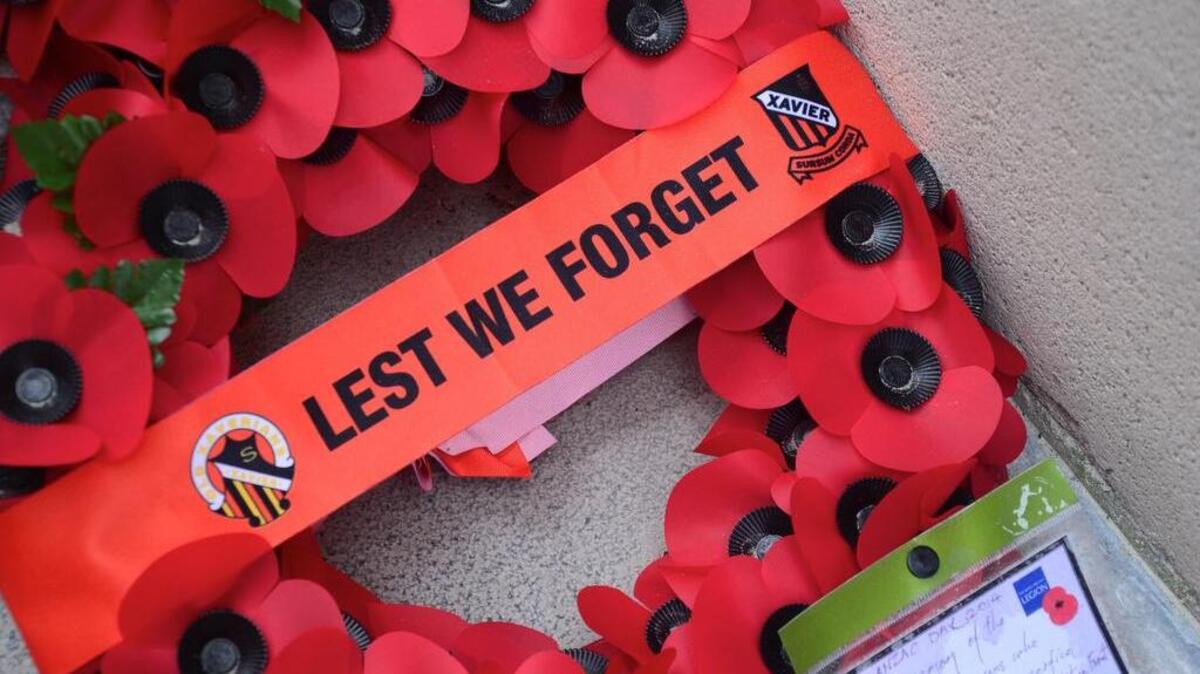 Wreaths of paper poppies honor the dead of World War I at the Menin Gate in the Flemish city of Ypres, Belgium.