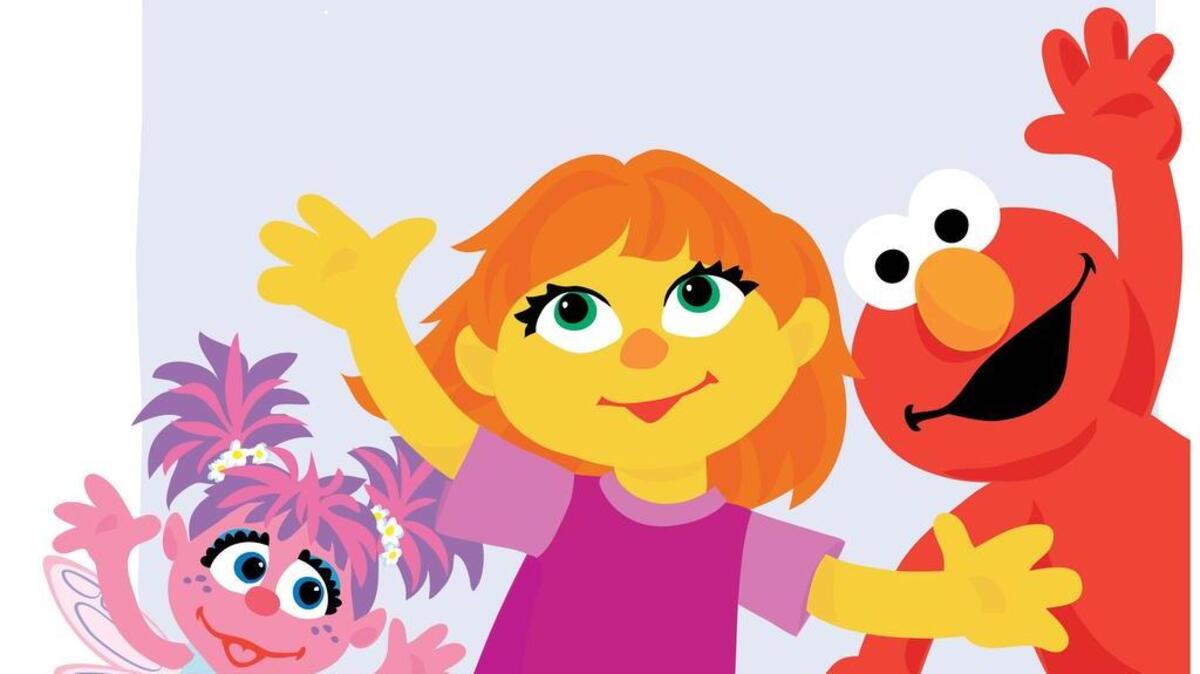 Julia, center, is the newest muppet, and the first with autism.