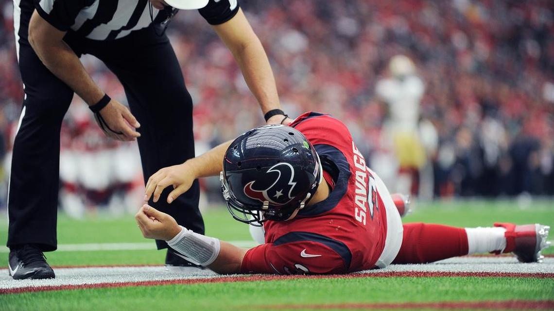 Houston Texans quarterback Tom Savage (3) is checked by a referee after he was hit during the first half of an NFL football game against the San Francisco 49ers, in Houston last month. Savage left the game and it was later determined he had a concussion. On Friday, Dec. 29, 2017, the NFL announced a series of changes to the way possible concussions are handled during games following the incident in which Savage was allowed to return to the field after a hit left him on the ground, arms shaking.