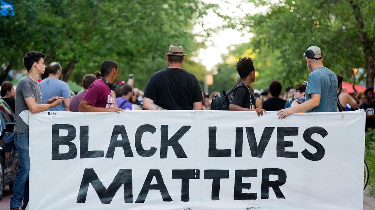 A Black Lives Matter rally Friday in Kalamazoo, Mich. Demonstrators demanded change from Kalamazoo government officials and Kalamazoo Public Safety.