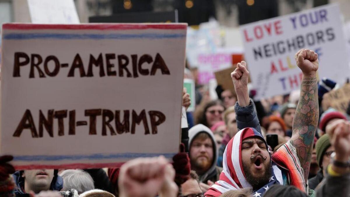 Protests, like this one in Boston, erupted across the nation after President Trump signed an executive order Jan. 27 that bans people from seven Muslim-majority nations from entering the U.S. for 90 days and puts an indefinite hold on a program resettling Syrian refugees.