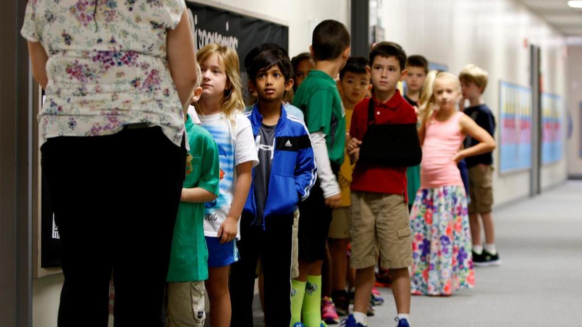 Chloe Bennett with students Aug. 22 on the first day of school at Johnson Elementary in Southlake.