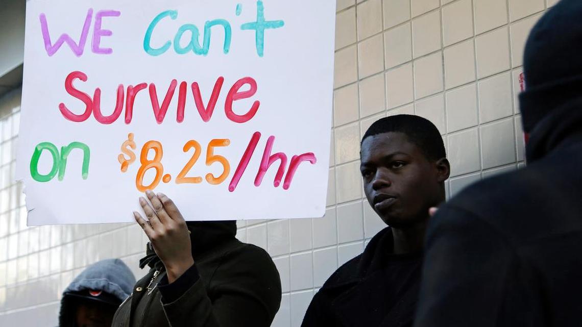 Fast food workers demonstrate for an increase in wages.