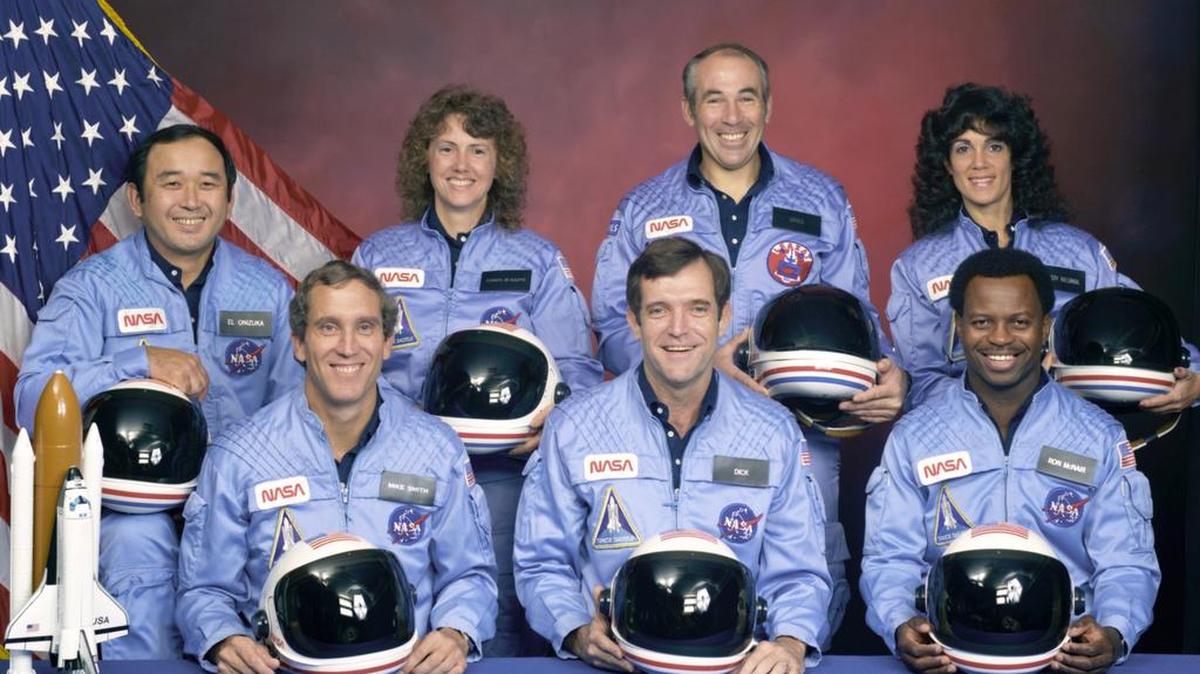 Challenger astronauts from front left: Pilot Michael J. Smith, Commander Francis R. (Dick) Scobee and mission specialist Ronald E. McNair. From rear left: mission specialist Ellison Onizuka, teacher Christa McAuliffe, payload specialist Gregory Jarvis, and mission specialist Judith Resnik.