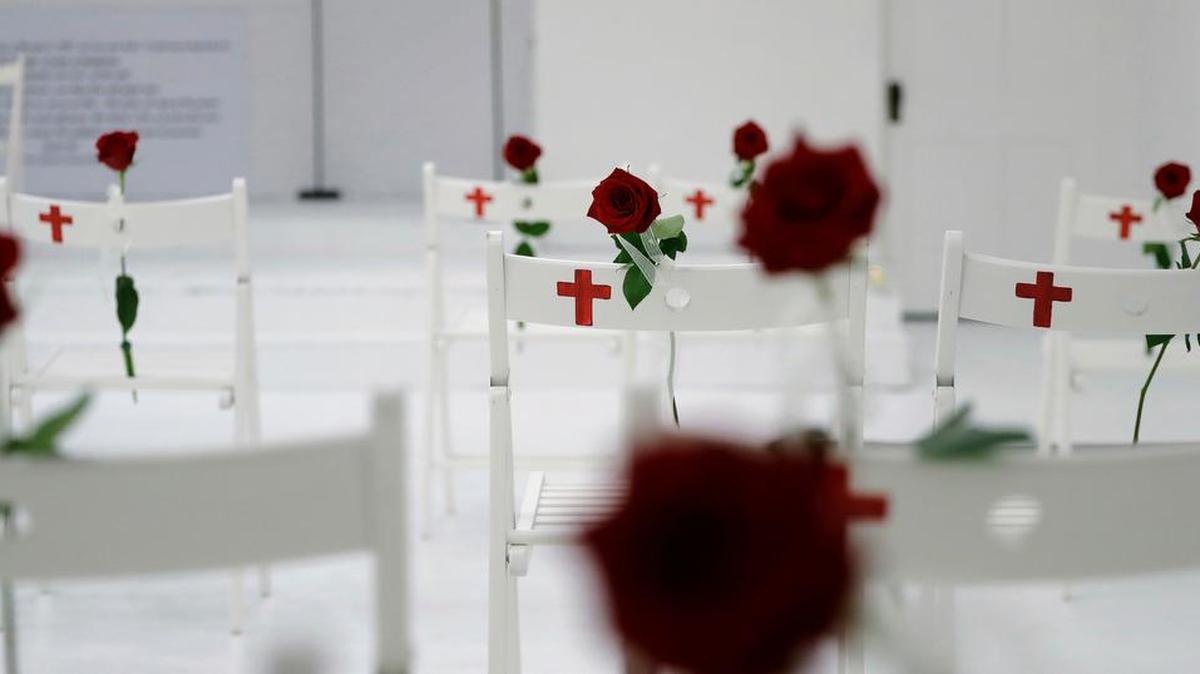 A memorial for the victims of the shooting at Sutherland Springs Baptist Church includes 26 white chairs, each painted with a cross and and rose, placed in the sanctuary, Sunday, Nov. 12, 2017, in Sutherland Springs, Texas.