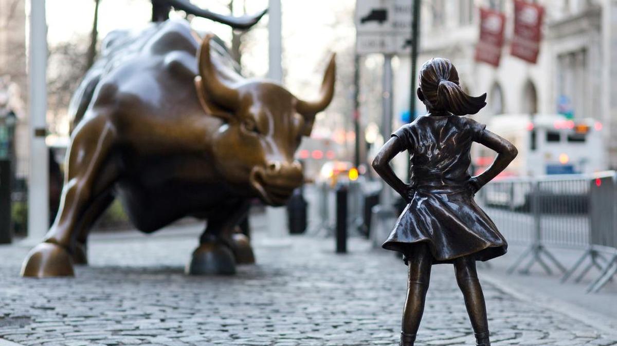 The Charging Bull and Fearless Girl statues are sit on Lower Broadway in New York. Since 1989 the bronze bull has stood in New York City's financial district as an image of the might and hard-charging spirit of Wall Street. But the installation of the bold girl defiantly standing in the bull's path has transformed the meaning of one of New York's best-known public artworks. Pressure is mounting on the city to let the Fearless Girl stay.