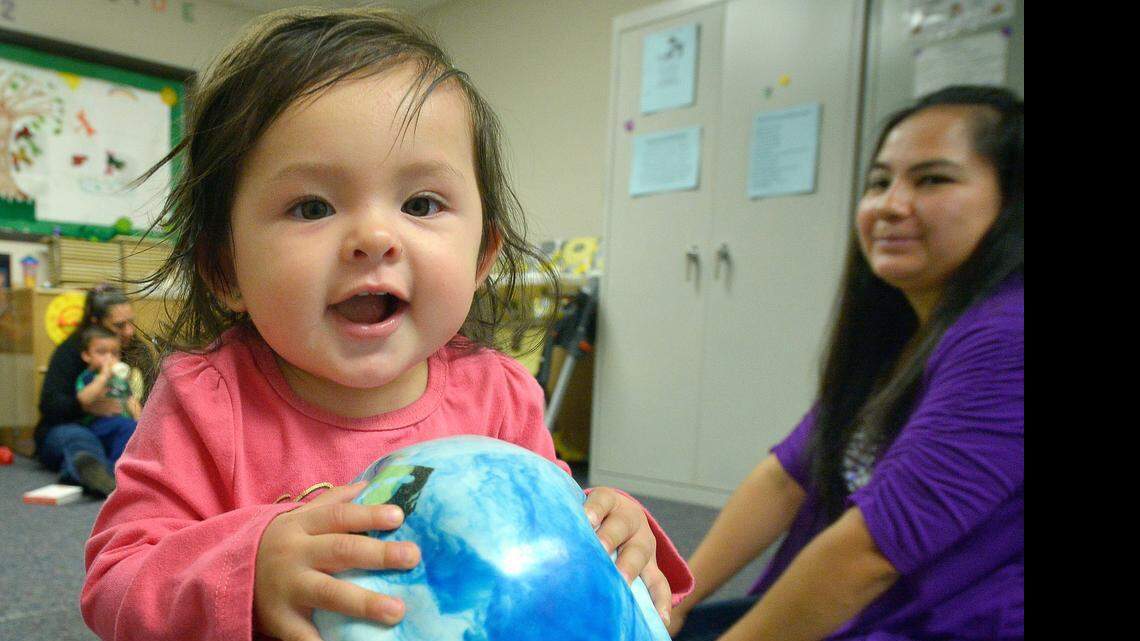 
Edith Avila with her niece Brooklyn Alfaro, 1, in Early Childhood Matters at Riverside Community Center in Fort Worth. 
