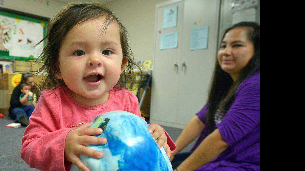 
Edith Avila with her niece Brooklyn Alfaro, 1, in Early Childhood Matters at Riverside Community Center in Fort Worth. 
