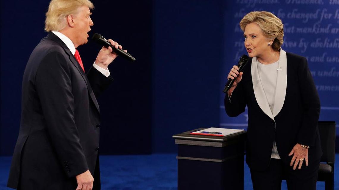 Republican presidential nominee Donald Trump and Democratic presidential nominee Hillary Clinton speak Oct. 9 during the second presidential debate at Washington University in St. Louis.
