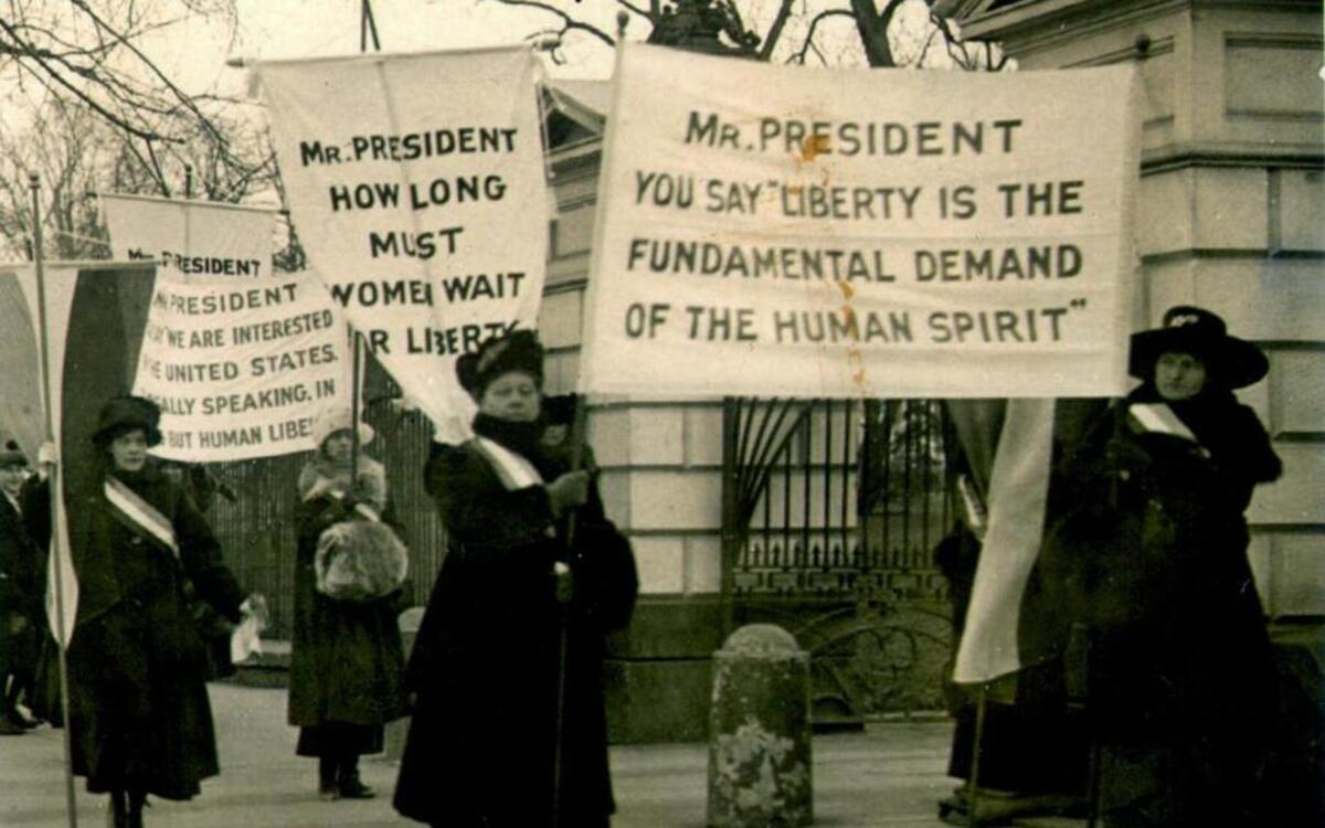 A circa 1918 file photo of women demonstrating at the White House demanding voting rights.