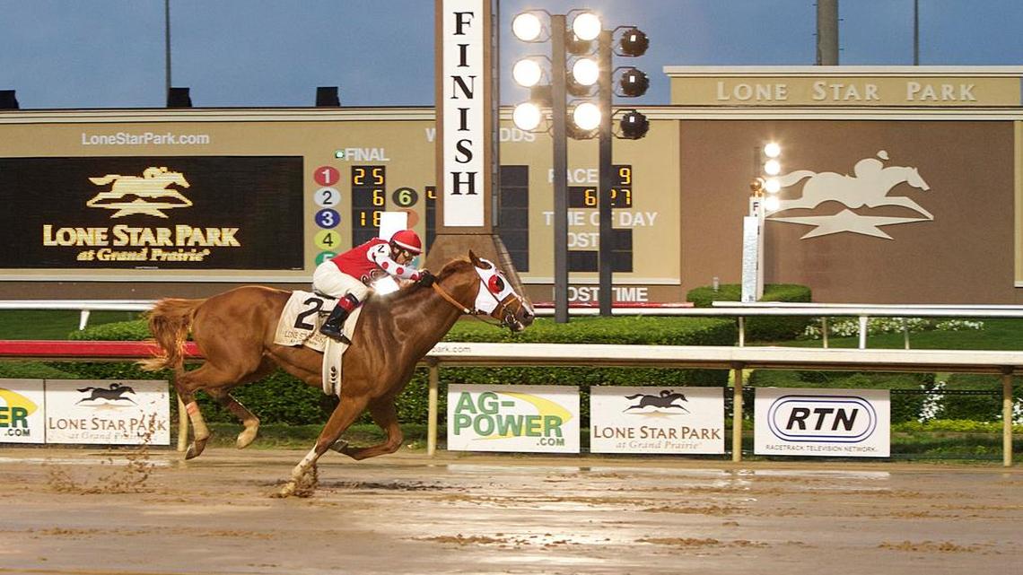 
Jockey Charles Lopez and Majestic City win the $200,000 Lone Star Handicap on May 25. 
