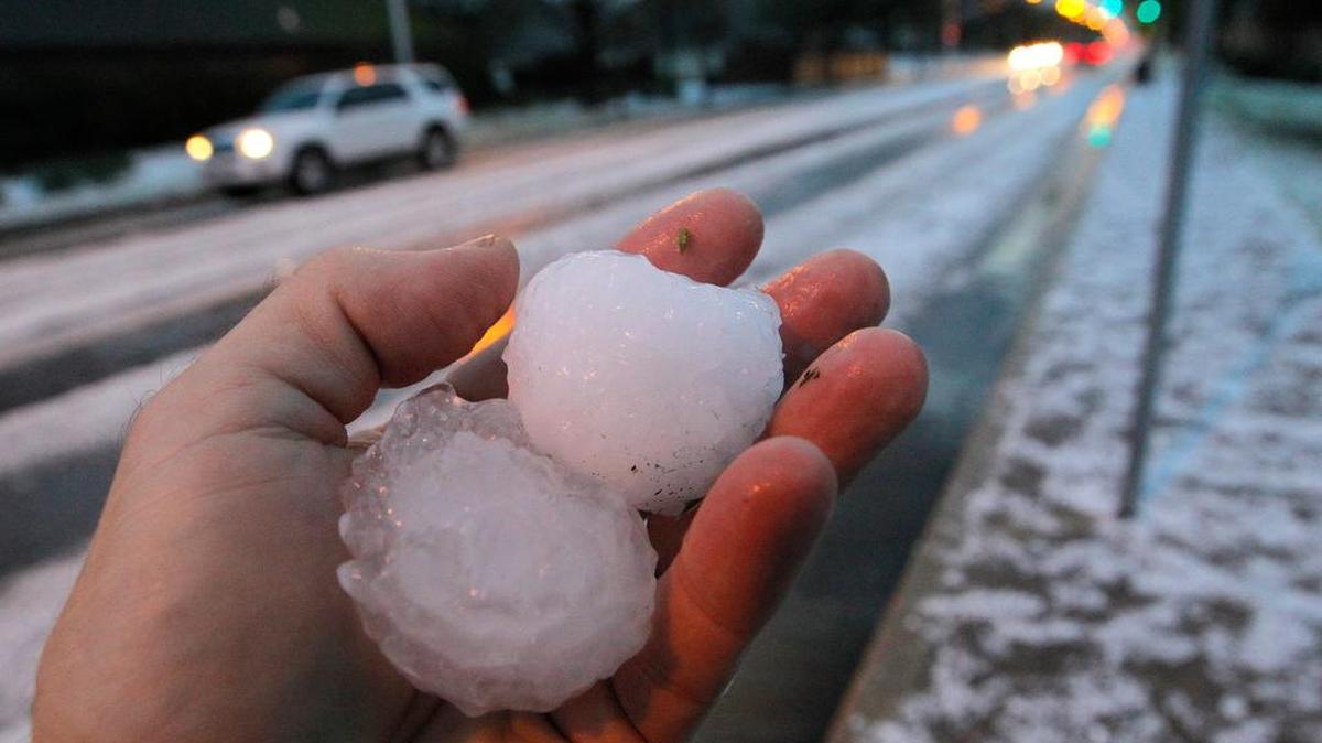 Two overnight storms produced hail, some larger than golf balls, on Forest Park Boulevard and the surrounding area near southwest Fort Worth, Thursday, March 17, 2016.