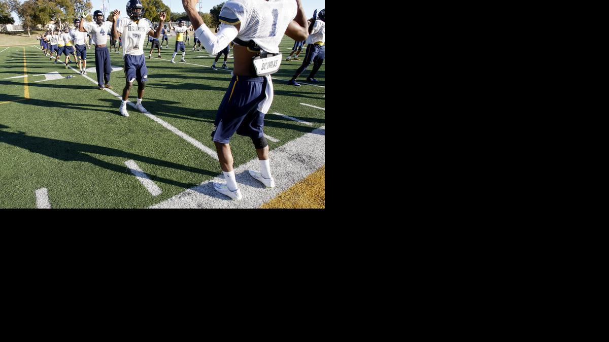 
Athletes use artificial turf at Arlington Heights High School. 
