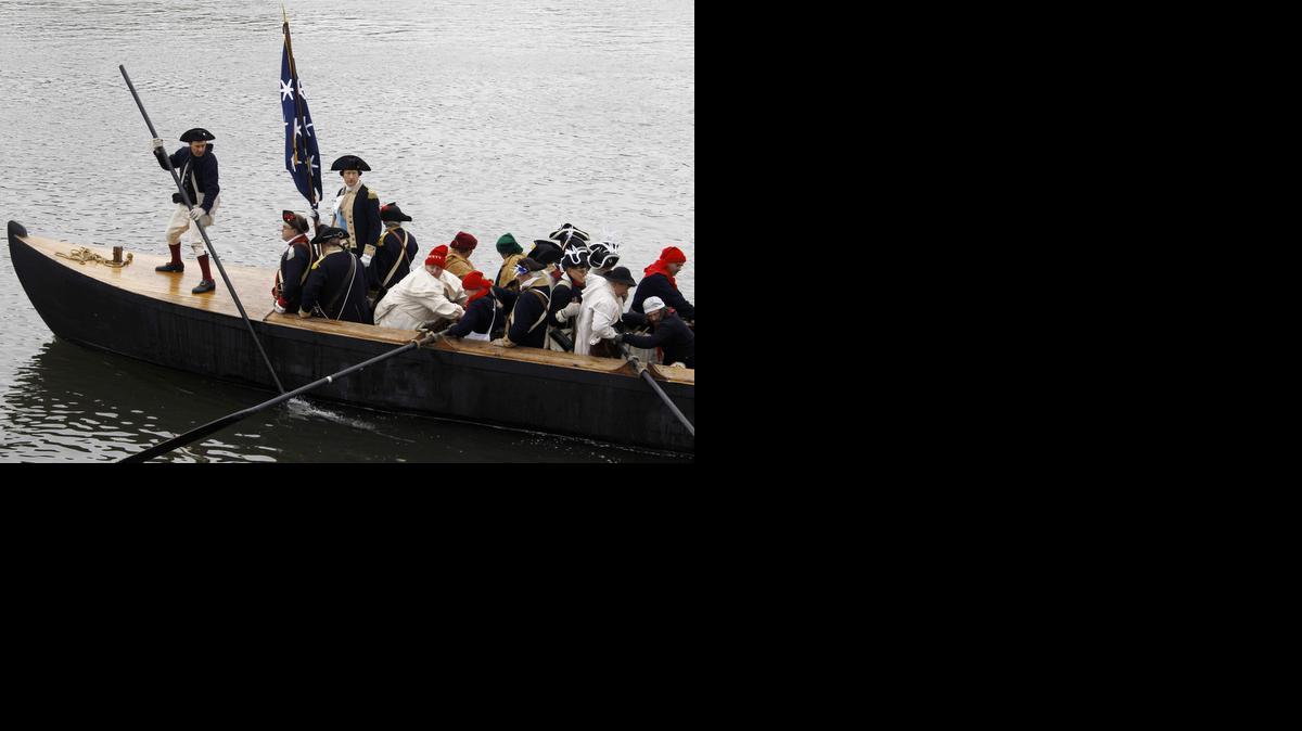 Reenactors portray Washington crossing the Delaware annually, but it was jammed with ice in 1776. <137>John Godzieba, portraying Gen. George Washington, fourth from left, stands on a Durham boat during a re-enactment of Washington's historic crossing of the Delaware River, Friday, Dec. 25, 2009, in Washington Crossing, Pa. (AP Photo/Matt Slocum) ORG XMIT: PAMS103<137>