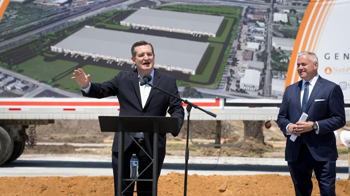 Senator Ted Cruz spoke in Arlington with Steve Kiefer, GM senior vice president of Global Purchasing and Supply Chain, right, as GM announced a big industrial complex to be built for suppliers to General Motors.