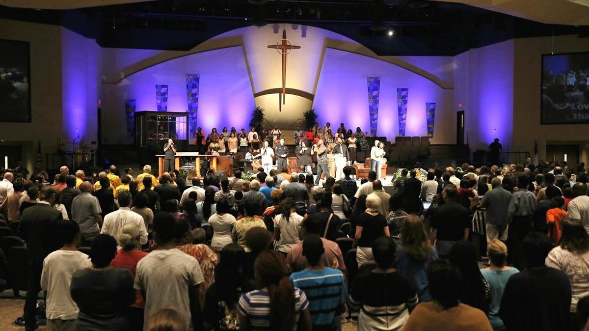 Hundreds gather for a "Unity, Peace and Prayer Rally" at Cornerstone Baptist Church, Wednesday, August 12, 2015. Arlington Police Chief Will Johnson, Arlington Mayor Jeff Williams, Pastor Dwight McKissic and Pastor Gary Smith led a discussion about the issues surrounding the fatal shooting of African-American teenager Christian Taylor, 19, by white Arlington Police Officer Brad Miller.