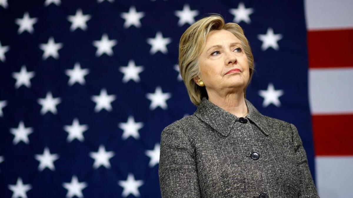 Democratic presidential candidate Hillary Clinton waits to be introduced during a campaign event at Western Technical College in La Crosse, Wis., Tuesday, March 29, 2016.