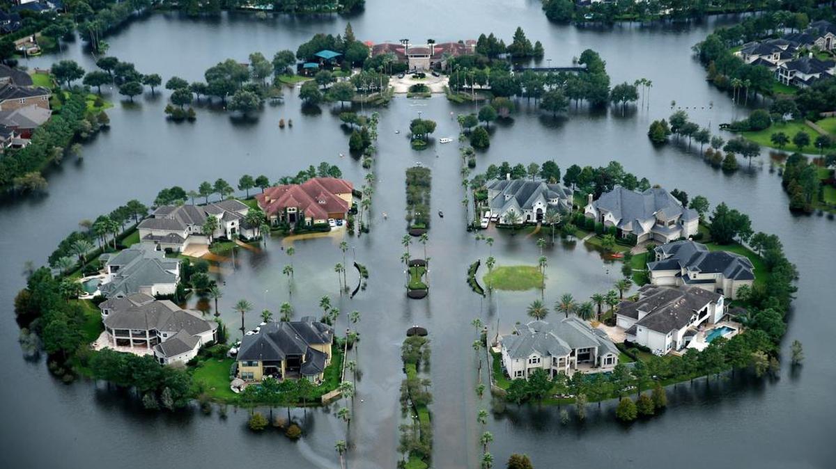 Flood waters have risen into the a West Houston neighborhood on Wednesday, Aug. 30, 2017.