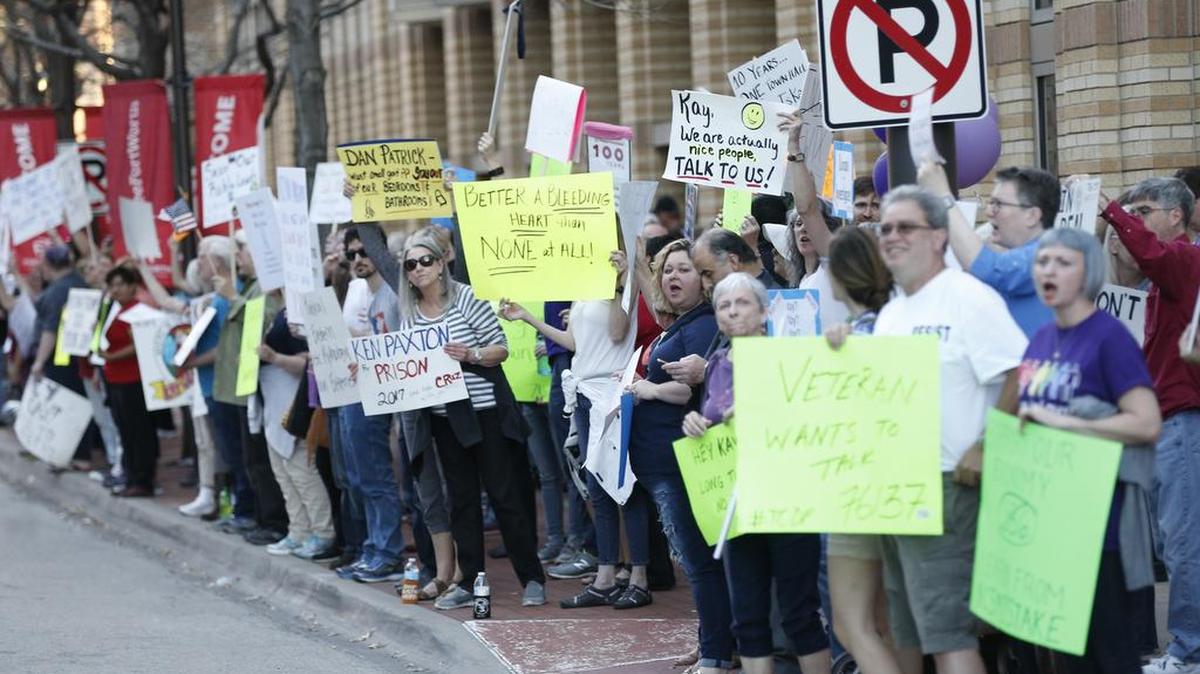 Demonstrators gathered outside the Omni Hotel in Fort Worth Feb. 18 as Republicans arrived for the party’s annual Lincoln Day Dinner.