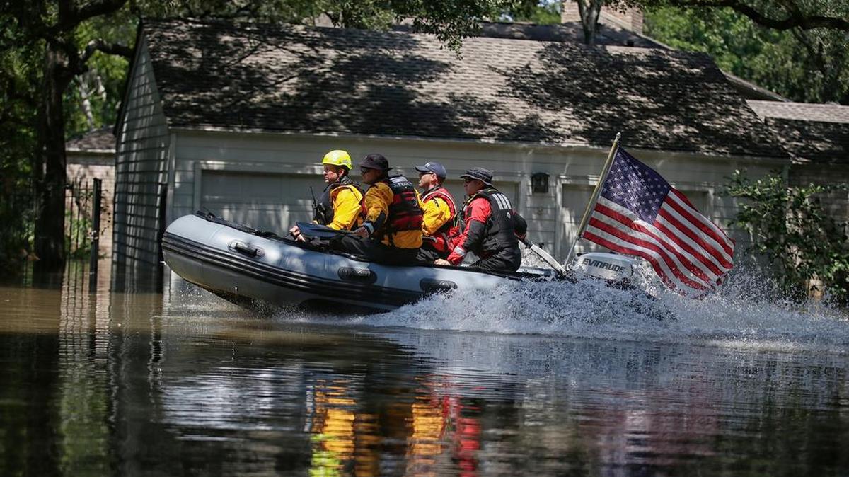 A search and rescue crew in West Houston as they search for flood victims on Thursday, Aug. 31, 2017.